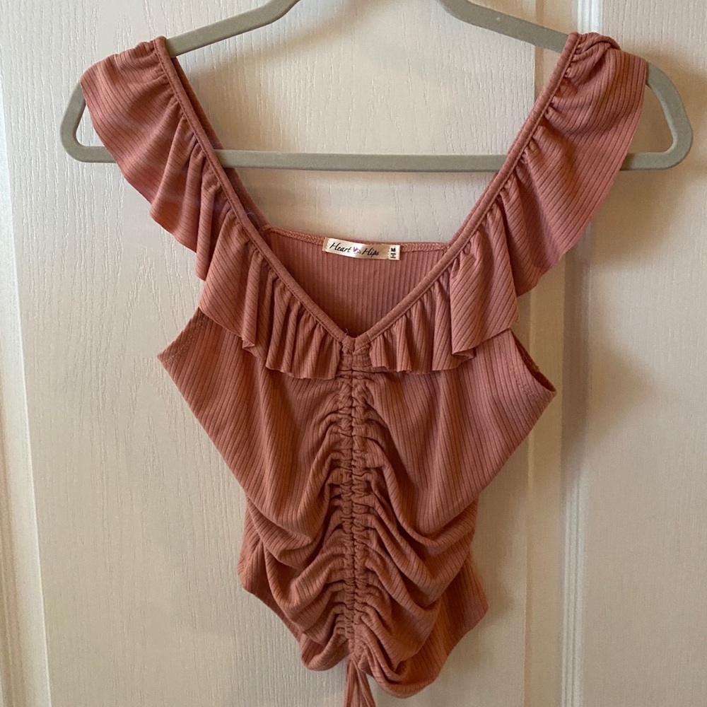 Ruffled tank top.